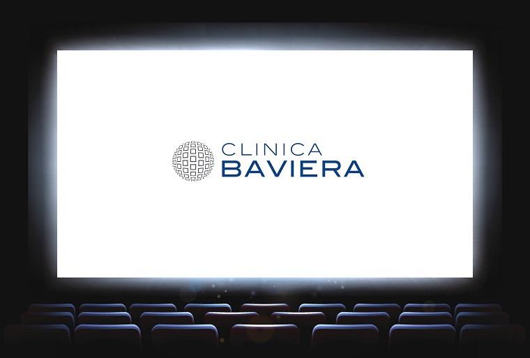 Pantalla de cine con logo de Clínica Baviera